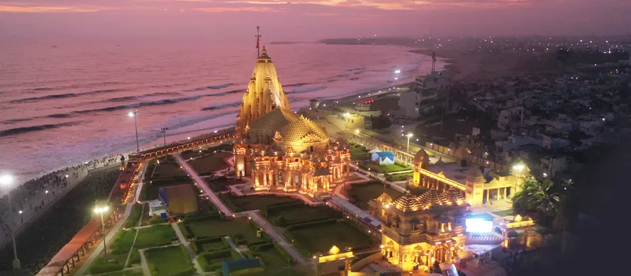 Somnath Temple lit at dusk, aerial view